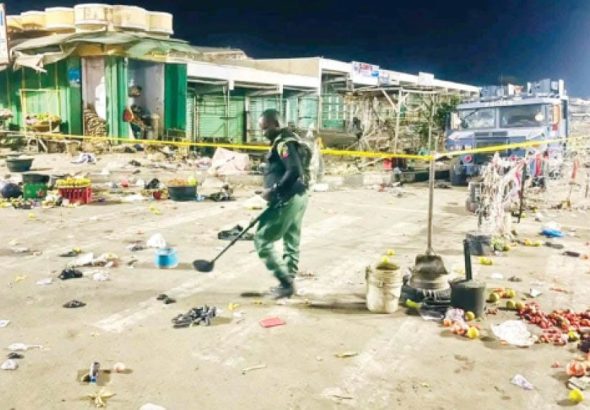 Police-anti-bomb-operative-at-the-scene-of-the-blast-at-the-Monday-Market-Maiduguri_1773946028