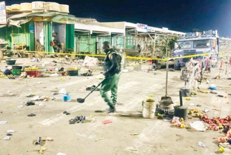 Police-anti-bomb-operative-at-the-scene-of-the-blast-at-the-Monday-Market-Maiduguri_1773946028